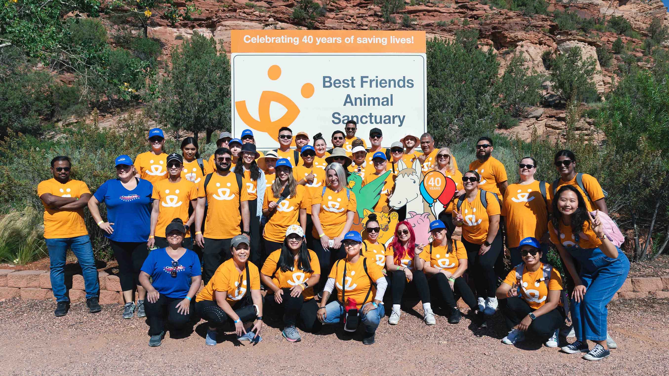 Credit One Bank and Best Friends Foundation group photo at Animal Sanctuary